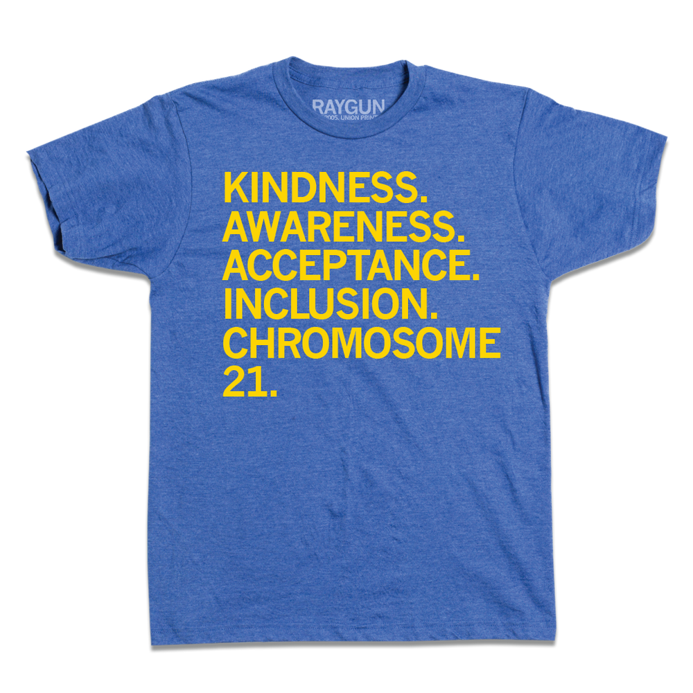 Heather royal blue shirt that reads "Kindness. Awareness. Acceptance. Inclusion. Chromosome 21." in yellow ink.