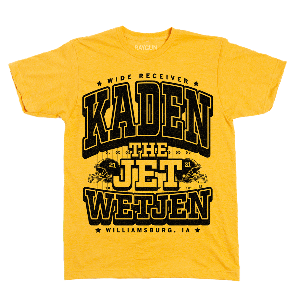 Mellow yellow shirt with black text that says, "Wide Receiver Kaden the Jet Wetjen. Willamsburg, IA" over an illustration of a football field and two footballs helmets facing either side with the number 21 on them.