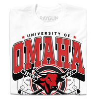 White shirt with red and black ink that says, "University of Omaha Hockey. Home of the Mavericks" with the university's bull mascot logo over a pair of crossing hockey sticks and an ice rink.