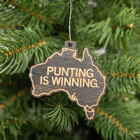Tory Taylor Wooden Punting Is Winning Holiday Ornament