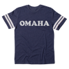 Navy blue short-sleeve vintage Omaha jersey with white stripes on the sleeves and the word OMAHA printed in distressed white letters across the chest.