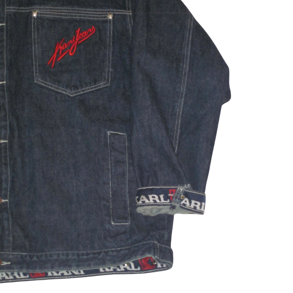 Vintage Kani Jeans jacket in dark wash denim featuring a red embroidered logo on the chest pocket and branded trim on the cuffs and hem.