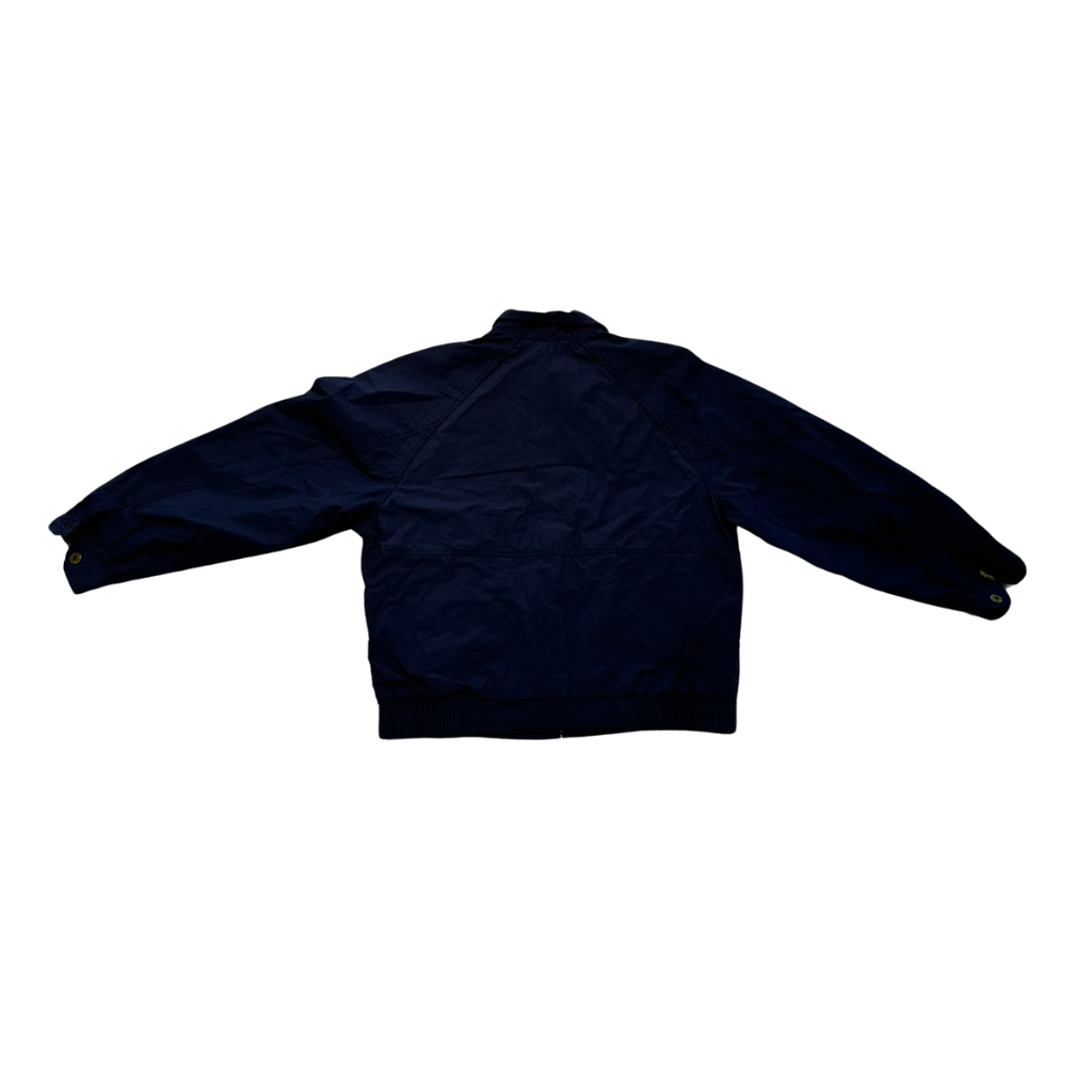 Back view of a navy blue Members Only windbreaker jacket.