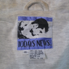 Clothing tag from a vintage Todays News jacket, reading TODAYS NEWS above a size XL label listing fabric content as 55% ramie and 45% cotton, with Made in China and manufacturing details below.