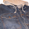 Medium wash denim jacket with a light gray hooded collar and white drawstring cords.