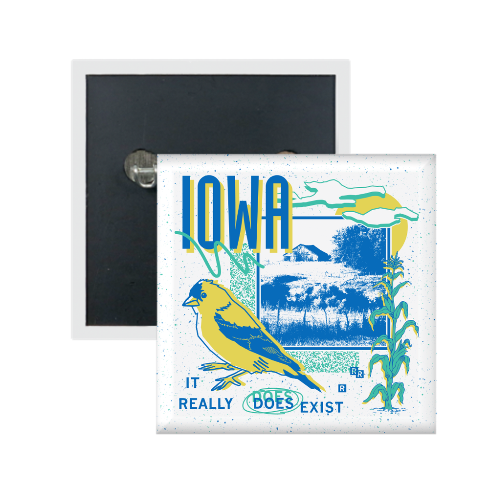 A white square metal button in a retro 90's style with a black print image of a farm. Blue text  across the tops says, "Iowa" with more below that reads, "It Really Does Exist." There's also a yellow bird, teal corn, teal squiggles, and more colorful accents.