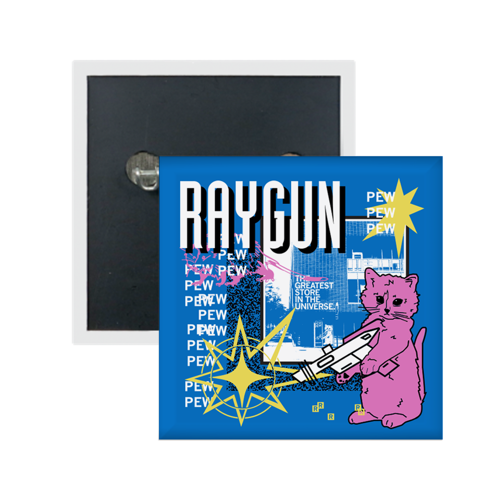 A blue square metal button in a retro 90's style with a white & blue print image of RAYGUN's Des Moines headquarters. Black & White text in the top right says, "RAYGUN" while smaller white text on the left says, "PEW PEW PEW PEW PEW PEW." Scattered across the magnet is a pink cat holding a white raygun, a pink outline of a opossum, yellow stars, and other accents.