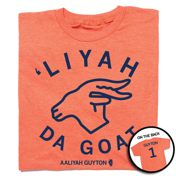 Folded heather orange t-shirt with navy ink that reads 