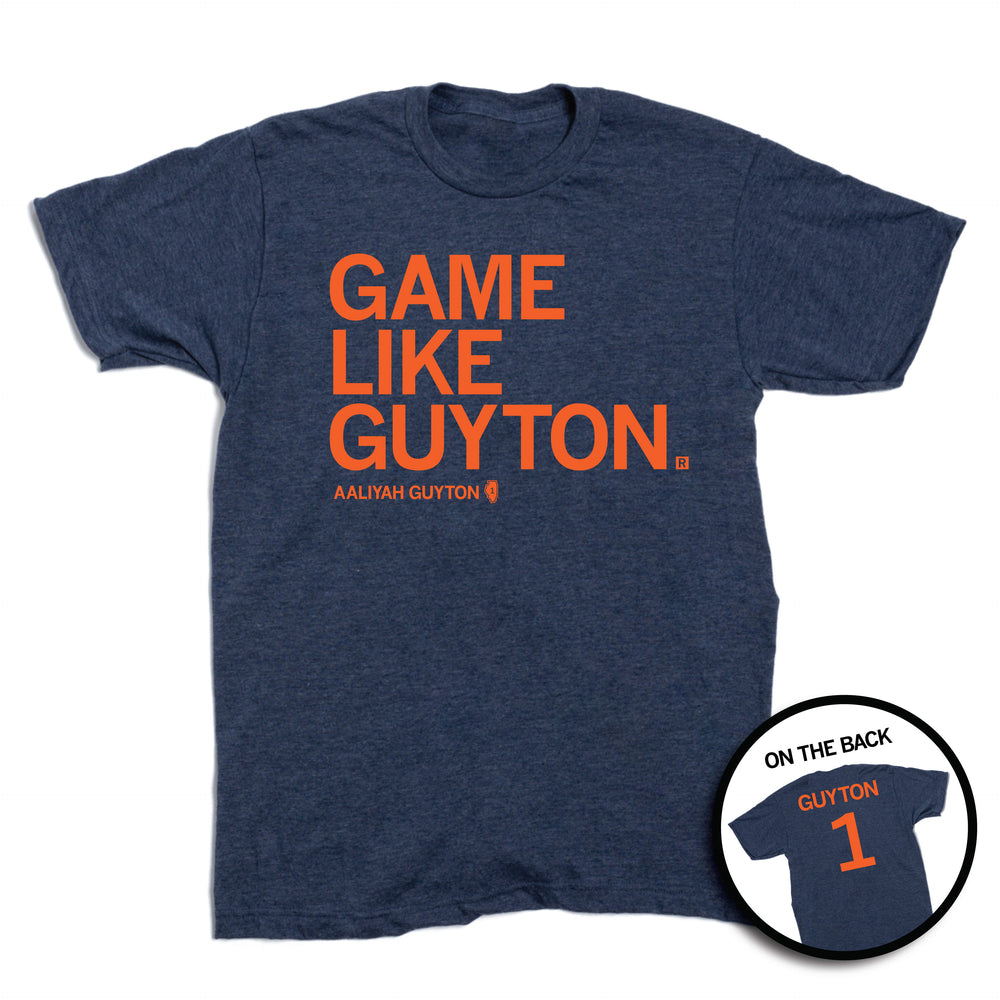 A heather navy shirt with orange ink that says, "Game Like Guyton. Aaliyah Guyton #1"