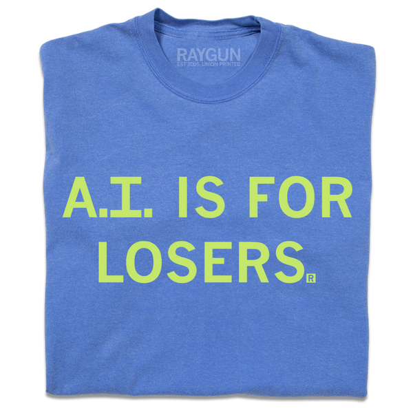 A folded blue shirt with pastel green ink that says, 