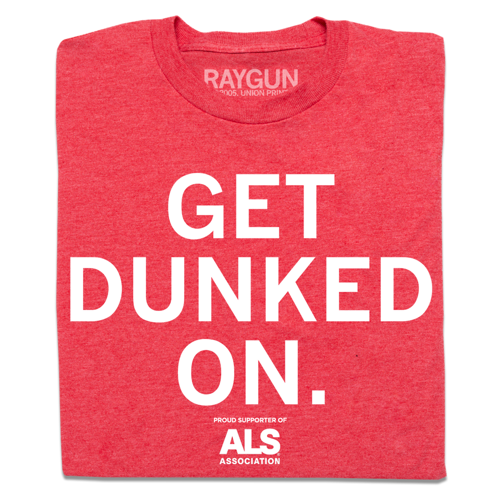 A folded heather red t-shirt with large white text that reads "GET DUNKED ON" with smaller text below that says, "Proud Supporter Of ALS Association"
