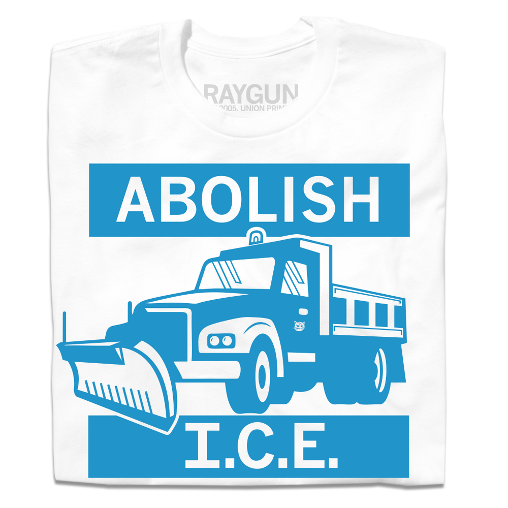 A folded white t-shirt with bright blue ink depicting a snow plow/salt truck with the text "Abolish" above and "I.C.E." below.