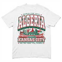 A white heavyweight t-shirt with kelly green and red ink. From top to bottom the text reads "World Cup 2026: Algeria meets Kansas City. One two three, viva L'Algerie." In the center is a depiction of notable buildings from Algeria and Kansas City mixed together.
