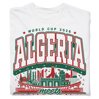A folded white heavyweight t-shirt with kelly green and red ink. From top to bottom the text reads "World Cup 2026: Algeria meets Kansas City. One two three, viva L'Algerie." In the center is a depiction of notable buildings from Algeria and Kansas City mixed together.