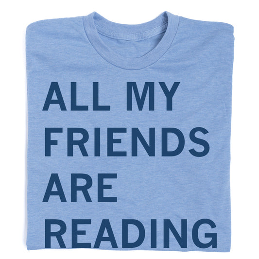 Light blue RAYGUN t-shirt with the text ALL MY FRIENDS ARE READING printed in navy blue.