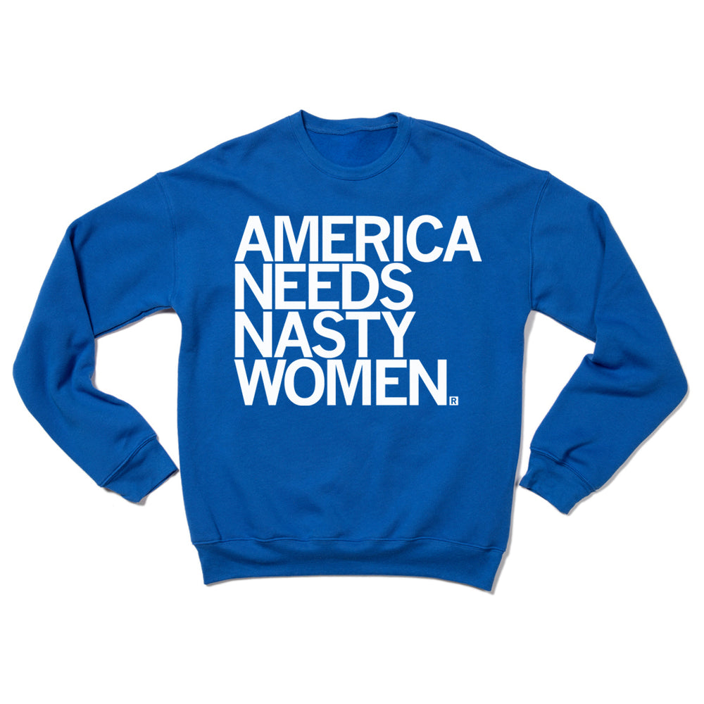A blue crewneck sweatshirt with white ink text that says, "AMERICA NEEDS NASTY WOMEN."