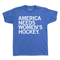 Heather royal tee with left-aligned white ink text that reads "America Needs Women's Hockey"