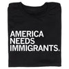Black union labor t-shirt with the text AMERICA NEEDS IMMIGRANTS printed in white capital letters.