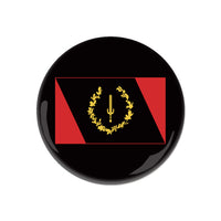 A black button with the Black American Heritage Flag centered on it.