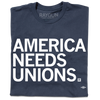 A folded navy t-shirt with "AMERICA NEEDS UNIONS" printed in white ink with our own union's union bug in the bottom right.