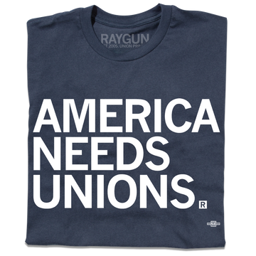 A folded navy t-shirt with "AMERICA NEEDS UNIONS" printed in white ink with our own union's union bug in the bottom right.