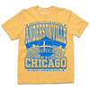 Heather gold t-shirt with bright blue print. Text from top-to-bottom reads "GREATEST CITY IN CHICAGO. ANDERSONVILLE. CHICAGO. SWEDE SOMMAR CHILD." There's an illustration of the Andersonville Swedish flag water tower in the center, surrounded by flowers.