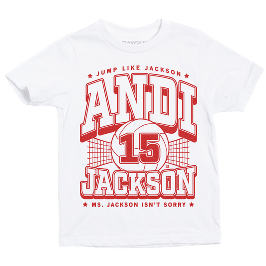 White Andi Jackson cotton t-shirt featuring a red graphic with the text JUMP LIKE JACKSON, ANDI, 15, JACKSON, and MS. JACKSON ISNT SORRY layered over a basketball net design.