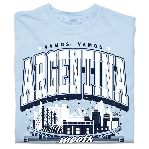 A light blue heavyweight t-shirt with navy and white ink. From the top to the bottom the text reads 