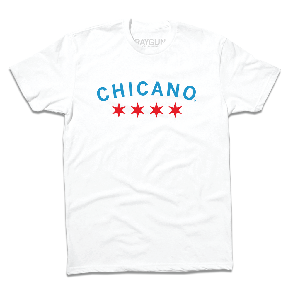 Short sleeve white t-shirt with Chicago flag color ink. "CHICANO" is printed in curved, blue text above four red stars.