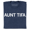 A folded heather navy t-shirt with white ink text that says, " Aunt Tifa"