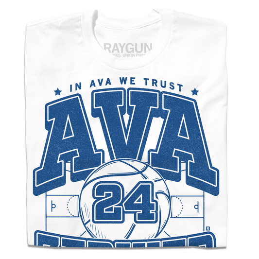 A folded white t- shirt with royal blue ink text that reads "In Ava We Trust. Ava Zediker. Guard. Des Moines, Iowa" over an image of a basketball court and a giant basketball in the center with the number 24 on it.