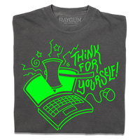 A folded heavyweight grey t-shirt with a bright green ink illustration of a laptop being cut in half by an axe and text to the right that says, "Think For Yourself!"