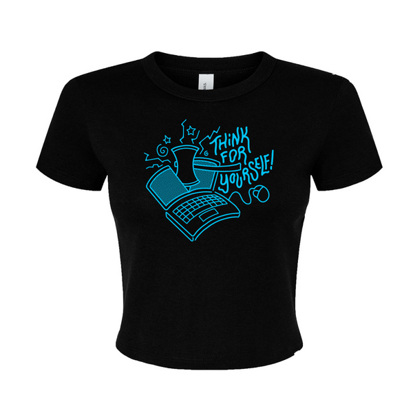 A black baby tee style t-shirt with bright blue ink print of a laptop being cut in half by an axe with text to the right that says, 