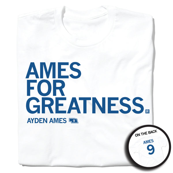 A folded white t-shirt with left-aligned royal blue text that says, 