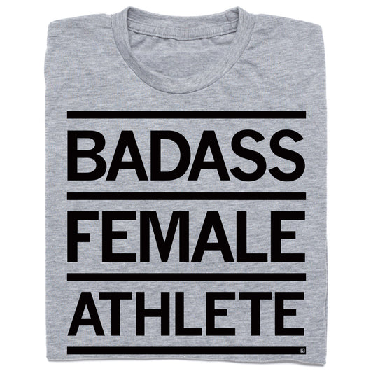 Heather gray crew neck T-shirt featuring the text BADASS FEMALE ATHLETE in bold black capital letters, set between horizontal black lines.