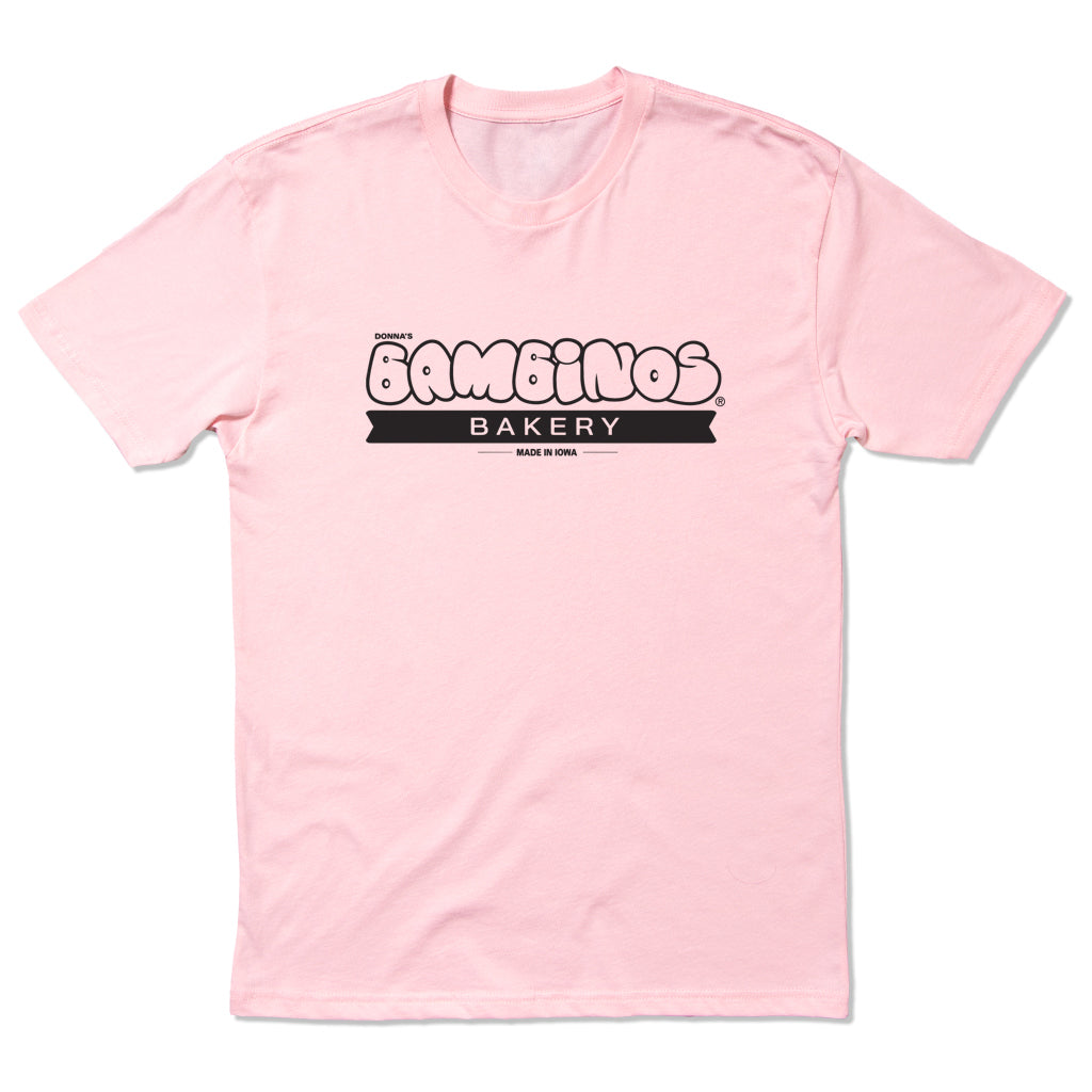 Light pink Donna’s Bambinos Bakery t-shirt with a black logo printed on the chest.