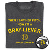 Charcoal T-shirt with the yellow text THEN I SAW HER PITCH, NOW IM A BRAY-LIEVER, a baseball icon, and the name BRAYLEN CONLON 13, with an inset showing the back of the shirt reading CONLON 13.