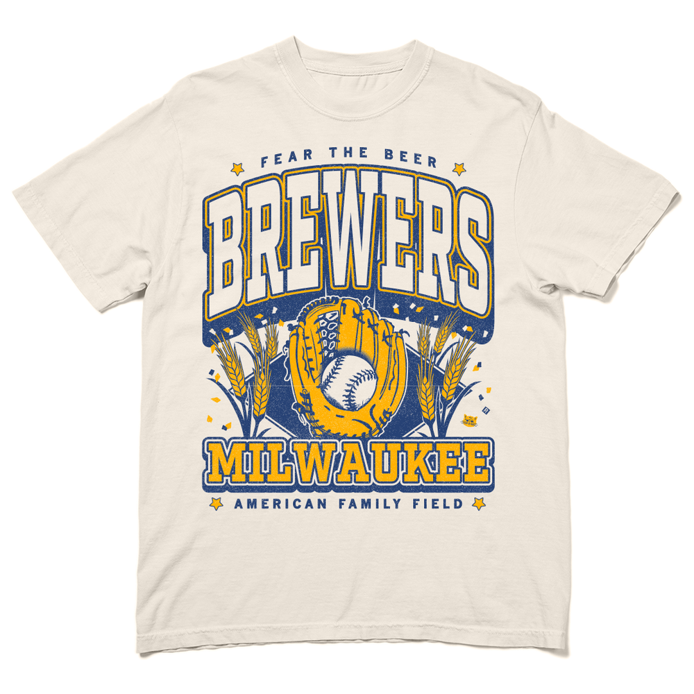 Comfort Colors short-sleeve heavyweight off-white t-shirt with gold and blue ink that reads "Fear the beer. Milwaukee Brewers. American Family Field." with a baseball landing in a mitt in the center and beer hops growing on either side.