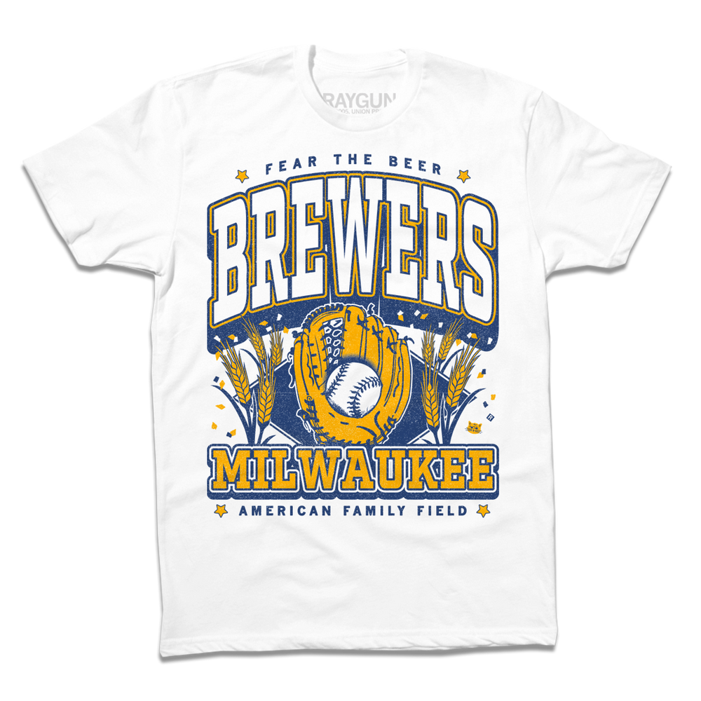 Short-sleeve white t-shirt with gold and blue ink that reads "Fear the beer. Milwaukee Brewers. American Family Field." with a baseball landing in a mitt in the center and beer hops growing on either side.