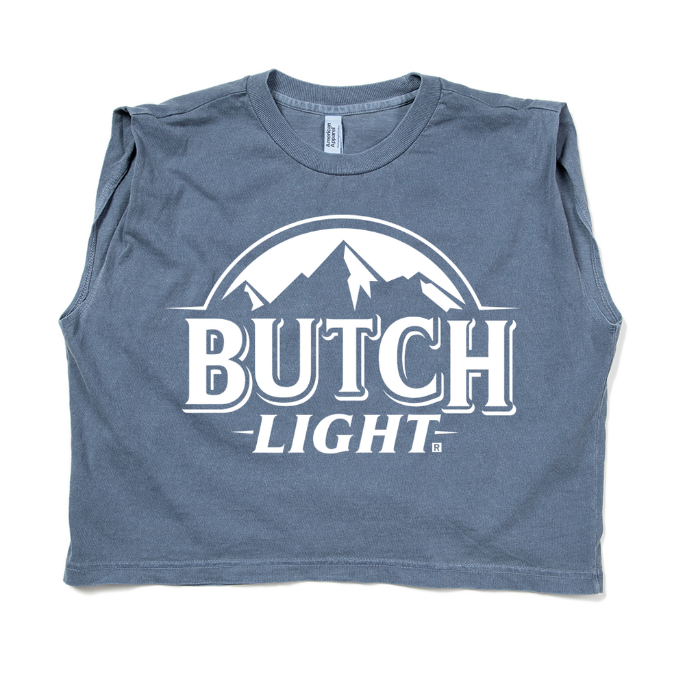 A steel blue sleeveless muscle crop top with white print of a mountain range with text below it that reads "Butch Light."