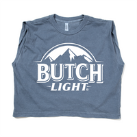 A steel blue sleeveless muscle crop top with white print of a mountain range with text below it that reads "Butch Light."