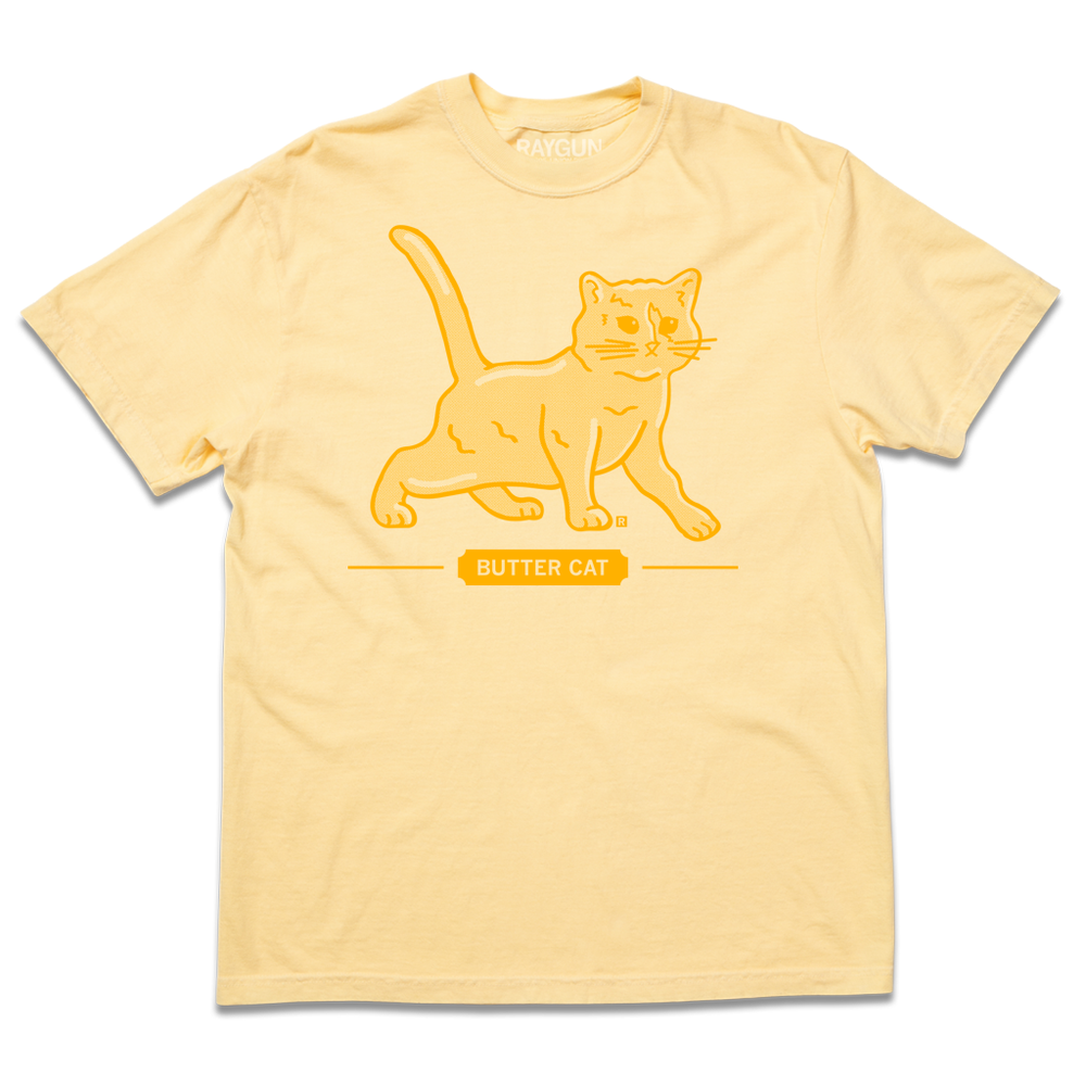 Heavyweight short-sleeve pastel yellow t-shirt with gold ink printed  a gradient depicting a cat made of butter. Text below says, "BUTTER CAT."