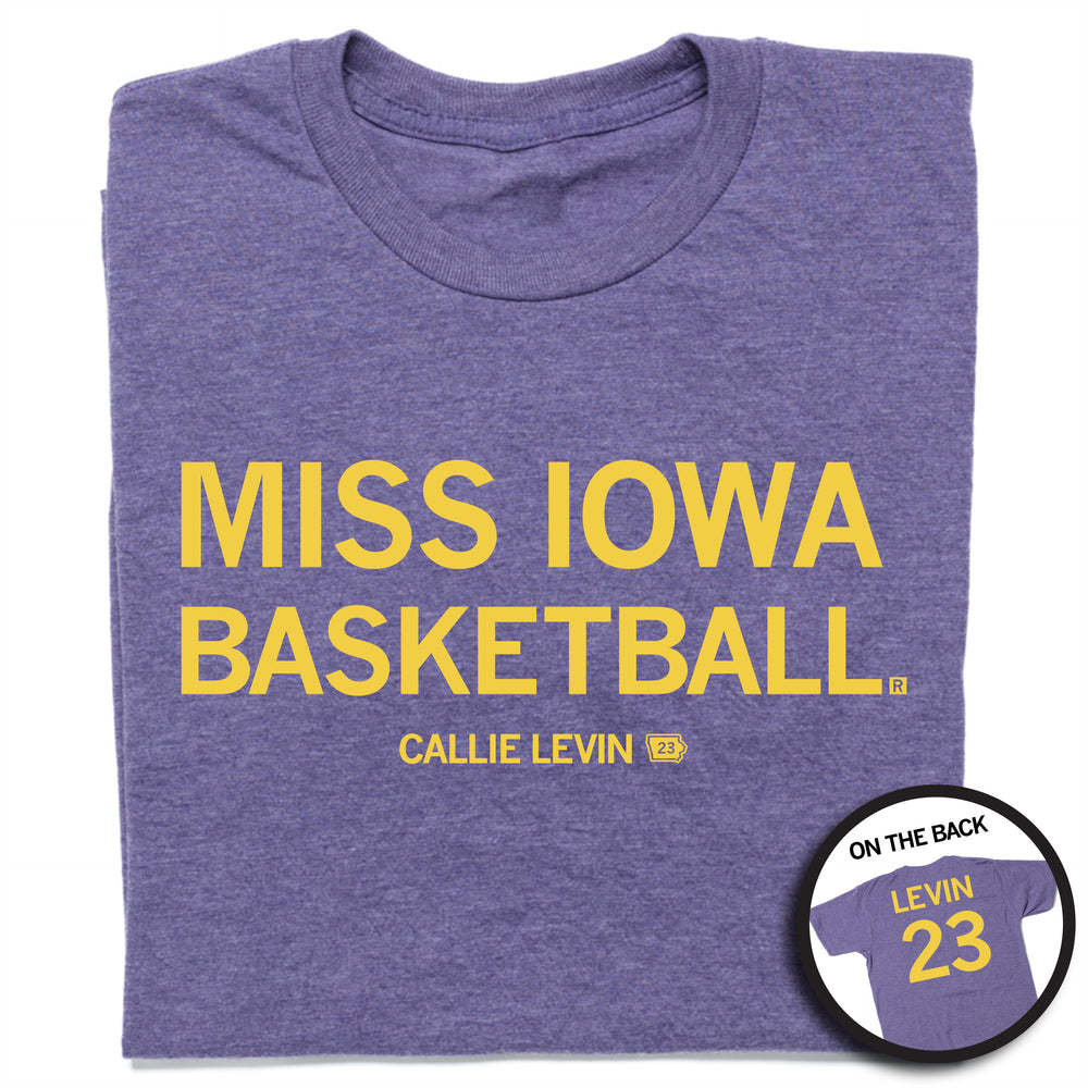 A folded heather purple t-shirt with yellow text that says, "MISS IOWA BASKETBALL" in large text with smaller print below that reads "CALLIE LEVIN" with an outline of Iowa beside it. The back print is laid out like a jersey with "LEVIN" at the top and the number 23 below.