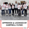 Eight people stand in a row, most wearing white RAYGUN t-shirts that say SOUP IS GOOD, with text below reading APPROVED & LICENSED BY CAMPBELL FLYNN!.