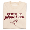 Folded off-white shirt with dark red print text that says, "CERTIFIED plover-BOY" above an illustration of a plover facing the right.
