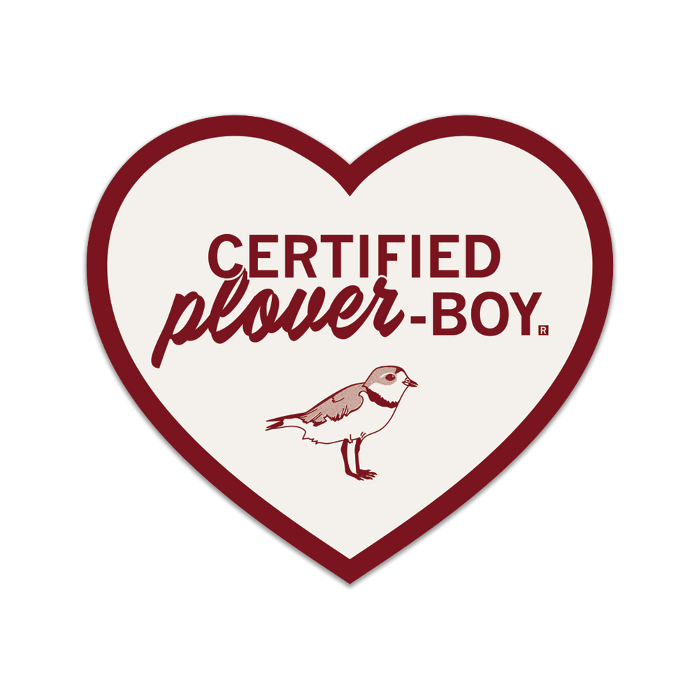 White heart-shaped die-cut sticker with a red border and red print that says, "Certified plover-boy" above a plover.