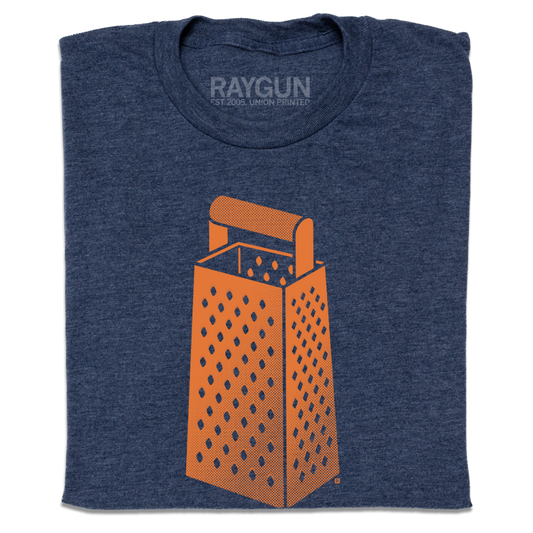 A folded heather navy t-shirt with an orange print of a cheese grater.