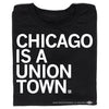 Black t-shirt with white text that reads, CHICAGO IS A UNION TOWN, celebrating the city’s legacy of union labor.
