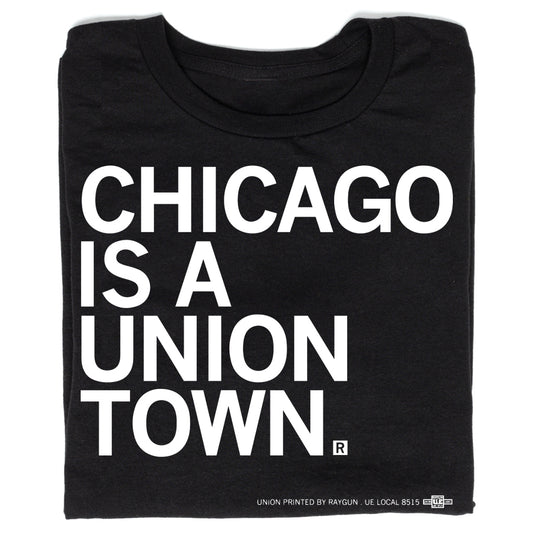 Black t-shirt with white text that reads, CHICAGO IS A UNION TOWN, celebrating the city’s legacy of union labor.