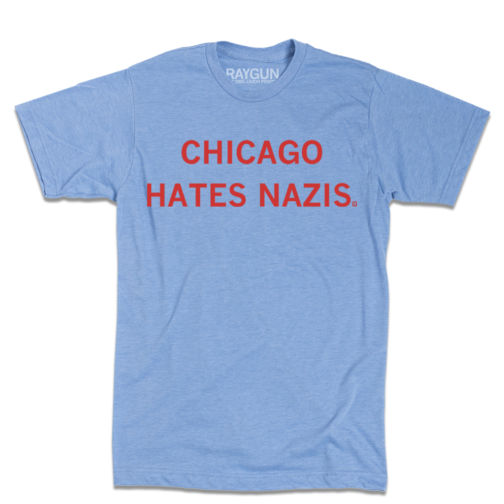 Light blue RAYGUN t-shirt featuring the text CHICAGO HATES NAZIS printed in red.